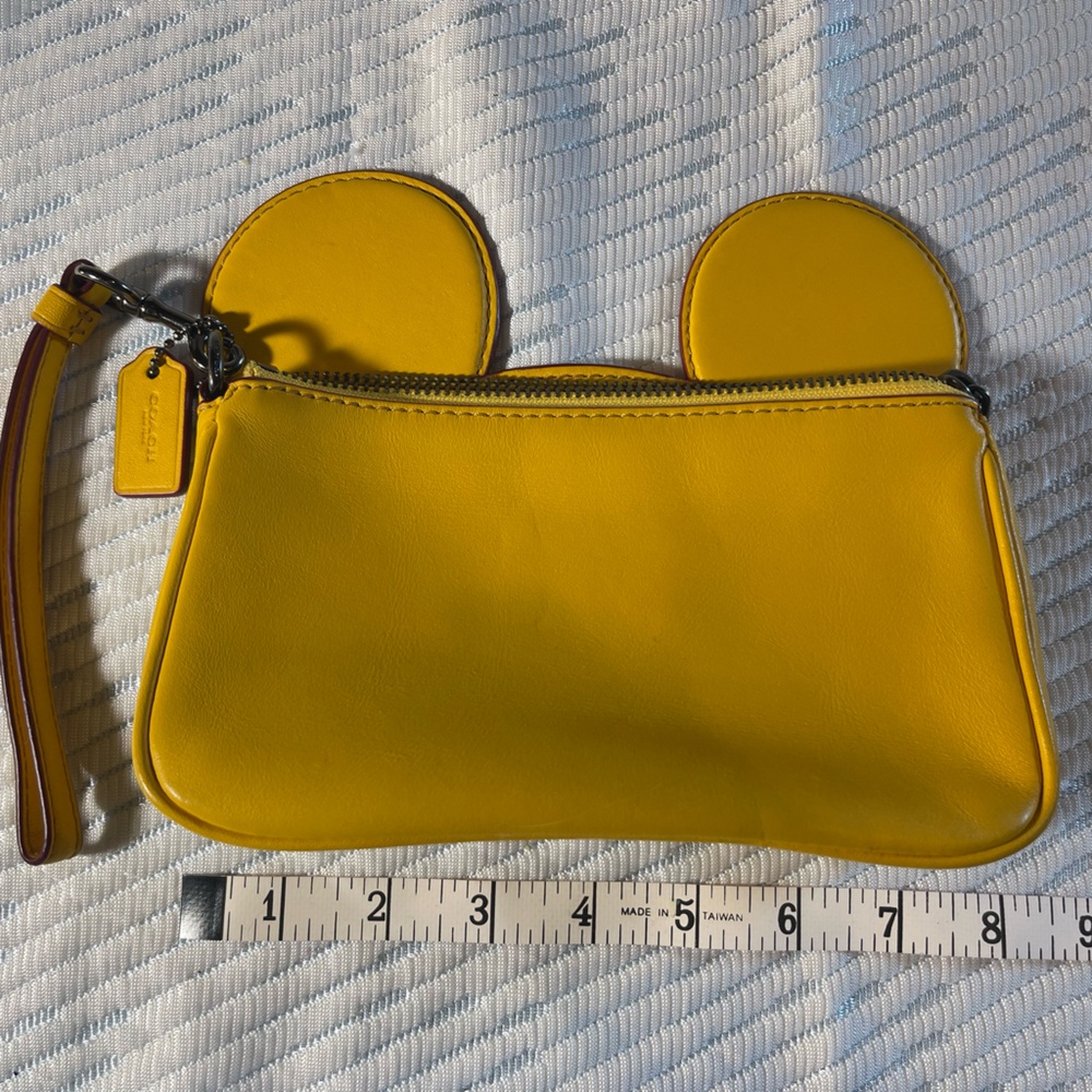 Coach leather Disney Mickey Mouse wristlet. Barely used! So adorable for Disney!